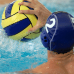 Water polo competitions and tournaments" depicting players in action, pool, and goal posts